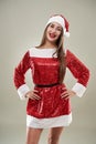 Beautiful Santa helper on gray background Royalty Free Stock Photo