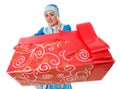 beautiful Santa helper holding sparkly Christmas present Royalty Free Stock Photo