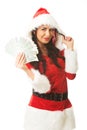 Beautiful santa woman holding a clip of polish money and hair wisp Royalty Free Stock Photo