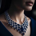 A beautiful sapphire necklace with diamonds on a tanned female neck,