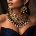 Beautiful sapphire necklace with perls and diamonds on tanned woman