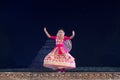 Beautiful Sattriya Dancer performing Sattriya Dance on stage at Konark Temple, Odisha, India..A assamese classical indian dance