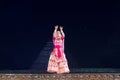 Beautiful Sattriya Dancer performing Sattriya Dance on stage at Konark Temple, Odisha, India..A assamese classical indian dance Royalty Free Stock Photo