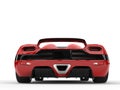 Beautiful scarlet red futuristic sports car - back view