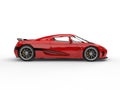 Beautiful scarlet red futuristic sports car - side view