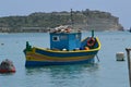 Beautiful scene of fishing boat in Marsaxlokk South of Malta Royalty Free Stock Photo