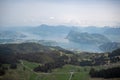 Beautiful scene of green forest at the hill and lake on mountains with clear sky background Royalty Free Stock Photo