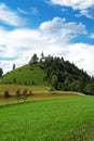 Beautiful scene of hill with catholic church on top in the summer Royalty Free Stock Photo