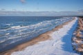 Beautiful scenery of Baltic Sea beach in Sobieszewo at snowy winter, Poland