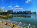 the beautiful scenery on the beach is equipped with a harmonious mix between the blue sea and the blue sky as well as thin clouds