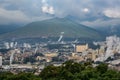 Beautiful scenery of Beppu cityscape with Steam drifted from public baths and ryokan onsen