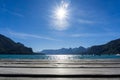 Beautiful scenery of the bright sun shining over the Wolfgangsee Lake in Strobl Austria Royalty Free Stock Photo