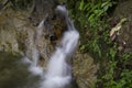 Beautiful scenery of cascaded river flowing through tropical rainforest