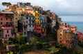 Beautiful scenery of Corniglia, an amazing village of colorful houses perched on a rocky cliff on a sunny summer day