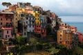 Beautiful scenery of Corniglia, an amazing village of colorful houses perched on a rocky cliff on a sunny summer day in Cinque