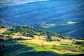 Beautiful scenery of a green mountainous landscape in the early morning Royalty Free Stock Photo