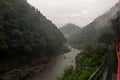 Beautiful scenery of the Katsura river seen from the red wagons of the Sagano Scenic Railway Royalty Free Stock Photo