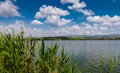 Beautiful scenery of Lake Mogan behind the reeds in a cloudy hot summer day in Ankara Royalty Free Stock Photo