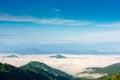 Beautiful scenery landscape of mountain with mist  and blue sky in morning light Royalty Free Stock Photo