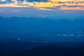 Beautiful scenery landscape of rainforest on mountain ridge with mist at sunset in the evening Royalty Free Stock Photo