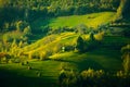 Beautiful scenery landscape Romania Holbav village mountains hills fields foggy morning