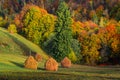 Beautiful scenery landscape Romania Holbav village mountains hills fields foggy morning Royalty Free Stock Photo