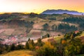 Beautiful scenery landscape Romania Holbav village mountains hills fields foggy morning Royalty Free Stock Photo