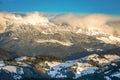 The Carpathians Bucegi Mountains Romania landscape winter snow ice clouds sunlight morning Royalty Free Stock Photo