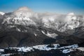 The Carpathians Bucegi Mountains Romania landscape winter snow ice clouds sunlight morning Royalty Free Stock Photo