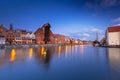 Beautiful scenery of the old town in Gdansk over Motlawa river at dawn, Poland Royalty Free Stock Photo