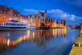 Beautiful scenery of the old town in Gdansk over Motlawa river at dawn, Poland Royalty Free Stock Photo