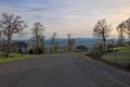 Beautiful scenery of a road surrounded by trees in Willamette Valley, Oregon Royalty Free Stock Photo