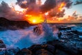 Beautiful scenery of rock formations by the sea at Queens Bath, Kauai, Hawaii at sunset Royalty Free Stock Photo