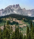 Beautiful scenery of rocky mountains and spruce trees at the Grand Teton National Park in Wyoming Royalty Free Stock Photo