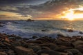 Beautiful scenery of rocky seashore and a sea during the sunset Royalty Free Stock Photo
