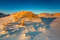 Beautiful scenery of sand dunes in the Slowinski National Park at sunset, Leba. Poland Royalty Free Stock Photo