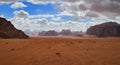 Beautiful Scenery Scenic Panoramic View Red Sand Desert and Ancient Sandstone Mountains Landscape in Wadi Rum, Jordan Royalty Free Stock Photo