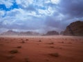Beautiful Scenery Scenic Panoramic View Red Sand Desert and Ancient Sandstone Mountains Landscape in Wadi Rum, Jordan during a San Royalty Free Stock Photo
