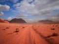 Beautiful Scenery Scenic Panoramic View Red Sand Desert and Ancient Sandstone Mountains Landscape in Wadi Rum, Jordan during a San Royalty Free Stock Photo