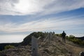 Beautiful scenery on the summit of Mount Gede Pangrango with several climbers who had just arrived and managed to reach the top Royalty Free Stock Photo