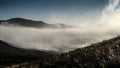 Fog rolling over the California mountains Royalty Free Stock Photo