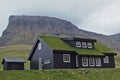 Beautiful scenery with typical house with grass roof. Faroe Islands Royalty Free Stock Photo