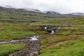 Beautiful scenery and waterfalls, mountains in Iceland, on the mountain pass road from Egilsstadir to Seydisfjordur