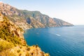 Beautiful scenic landscape of Positano. Rocky coastline full of boats and yachts traveling near high mountains. Cityscape of Royalty Free Stock Photo