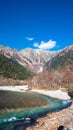 Andscape view of nature Kamikochi National Park in Autumn fall season with leaves change colors and clear water river Royalty Free Stock Photo