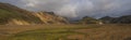 Beautiful scenic panorama of colorful volcanic mountains in Landmannalaugar camp site area of Fjallabak Nature Reserve Royalty Free Stock Photo