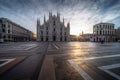 Beautiful scenic picture of Piazza Duomo of Milan Italy at sunrise and sun star Royalty Free Stock Photo