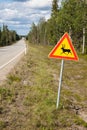 Beautiful scenic road in Norway. Typical warning road sign