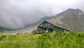 Beautiful scenic view of modern touristic house on Caucasus Mountains panorama