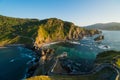 Beautiful scenic view at sunset of the north coast of Spain, by the island of San Juan de Gaztelugatxe, a fortress in Basque Royalty Free Stock Photo